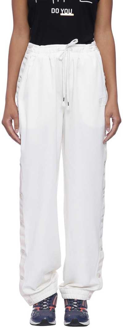 PUMA WOMENS TEARAWAY TRACKPANT (57469404)